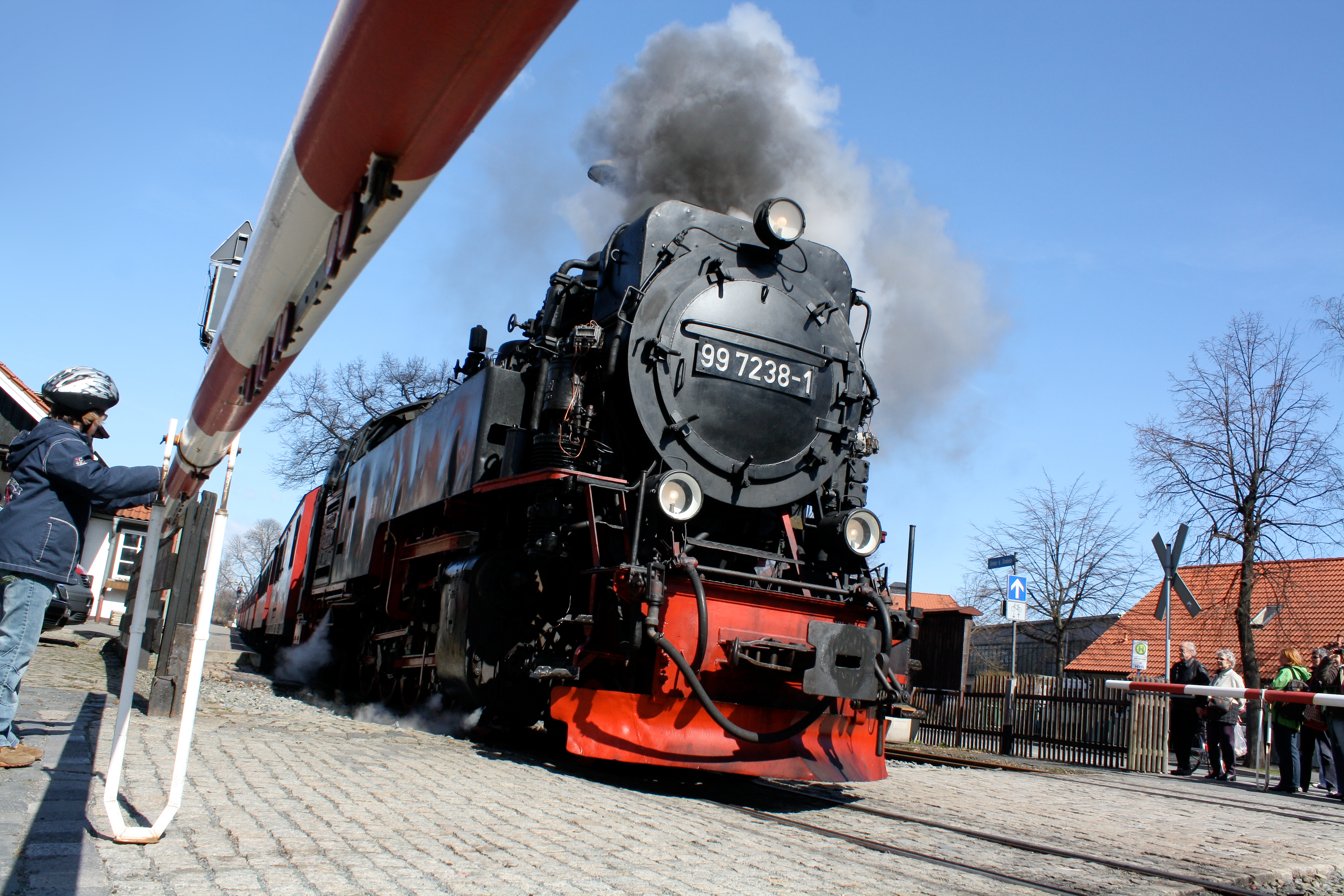 Photograph of a steam locomotive from a low angle